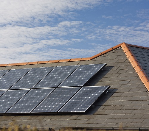 Photovoltaic Solar panels Mounted on a slate roof of residential or private home in Ontario
