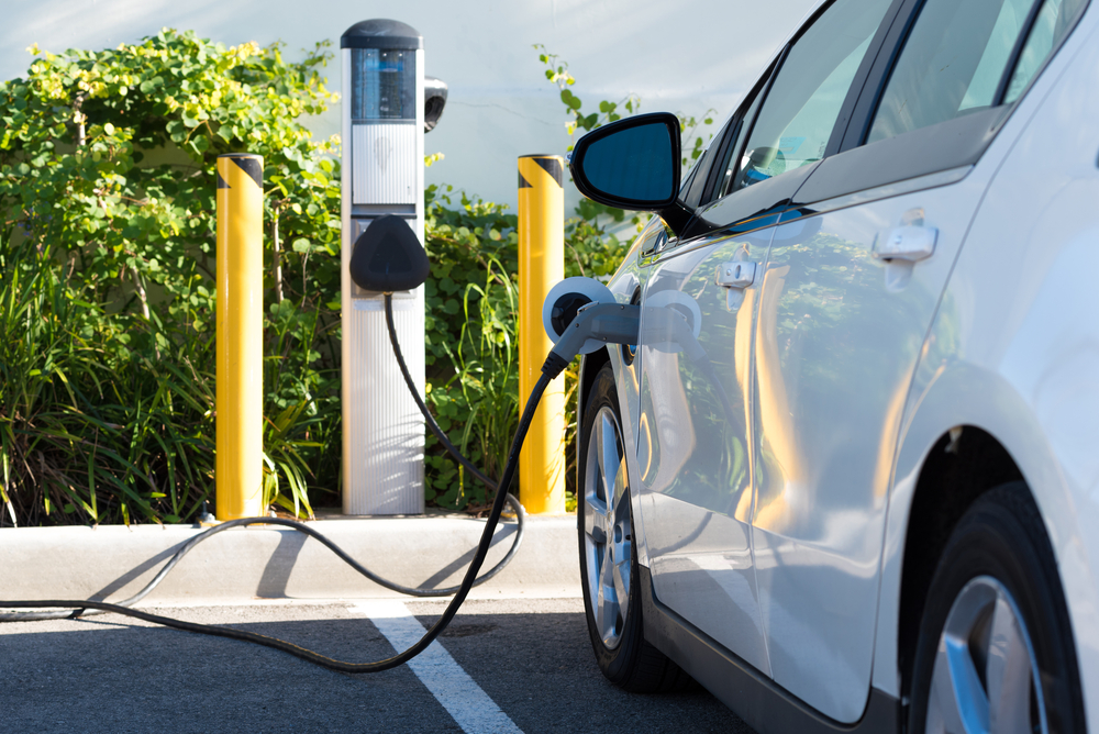 An electric car charging in Ontario