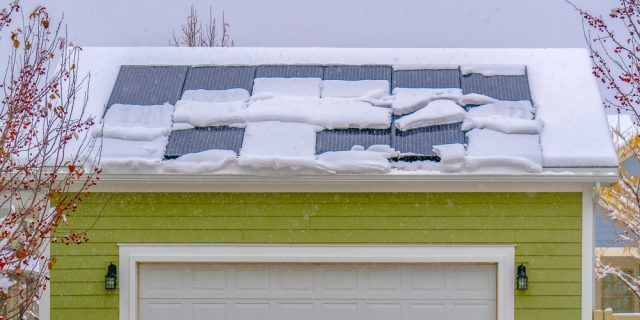 solar panels in Ontario covered by snow